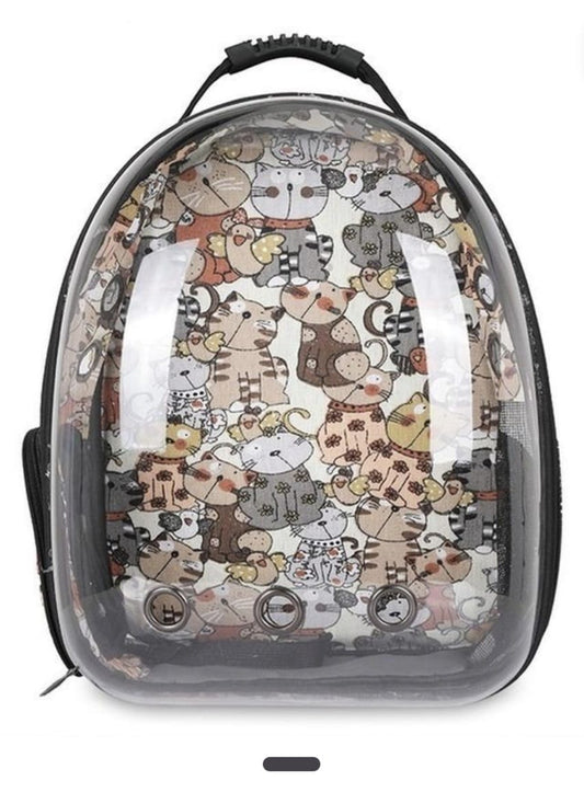 Take your feline friend on your next outdoor adventure in style and comfort with the Transparent Bubble Cat Backpack Carrier. Whether you are heading to the vet, taking a walk, or traveling across Egypt, this innovative carrier ensures your pet travels securely while enjoying a 180-degree panoramic view of the outside world.

Featuring a charming inner cartoon cat pattern, this backpack is as stylish as it is functional. The full clear front shell satisfies your cat's natural curiosity, reducing anxiety dur